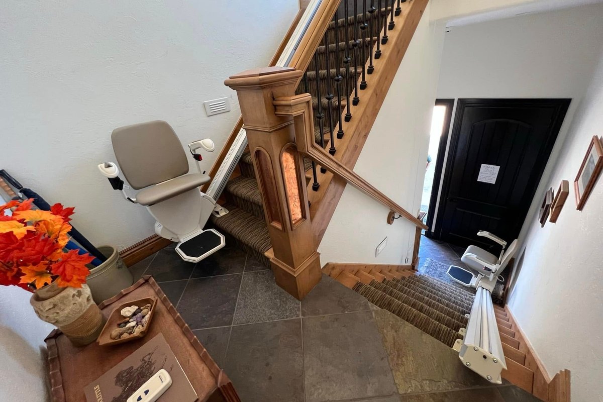 Entry hall with a Harmar SL600 stair lift on the short flight and another on the basement stairs