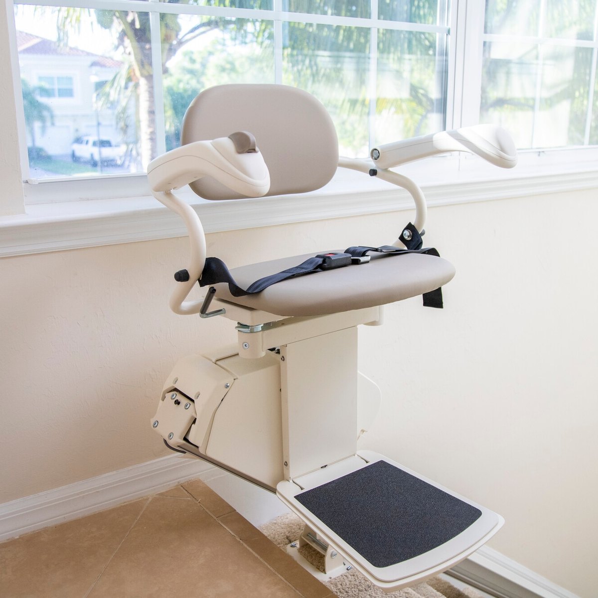 Harmar SL300 stair lift installed by a bright window