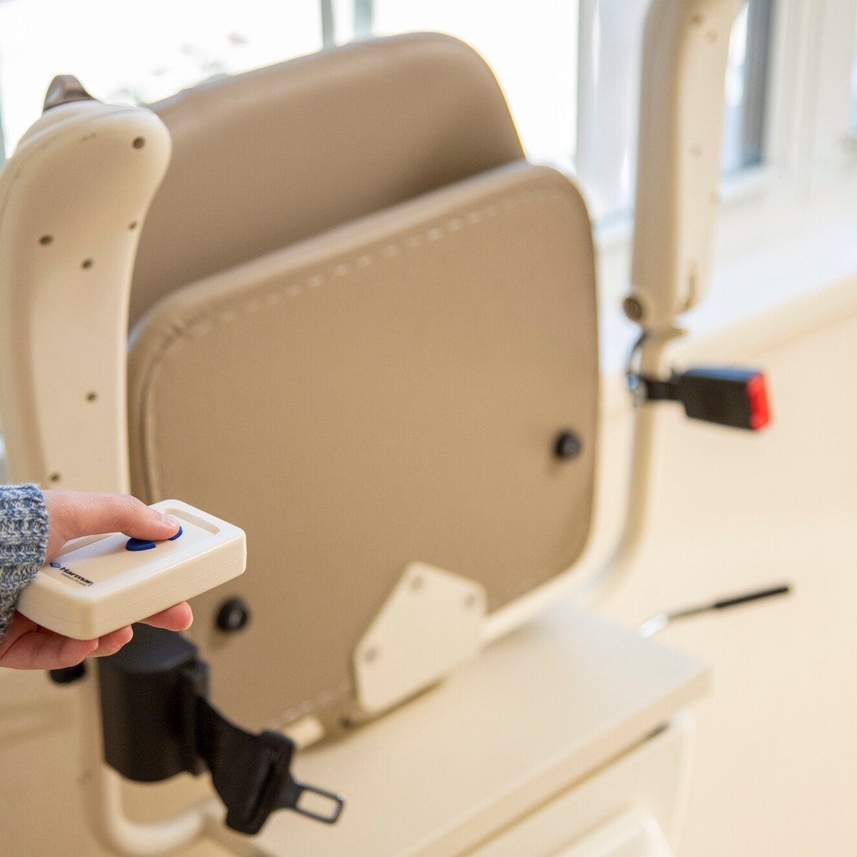 Calling a folded Harmar SL600 stair lift with its remote